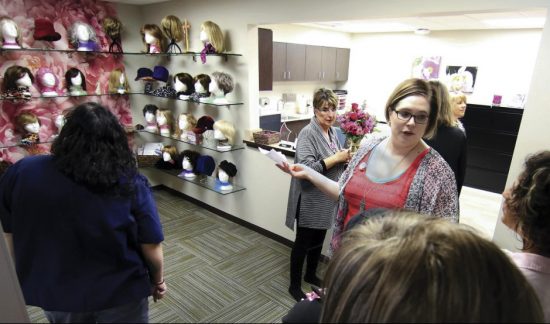 Lisa Beggs, breast navigator for the Breast Center gives a tour of the facility’s new location at 410 E. Spruce St. inside Heartland Cancer Center